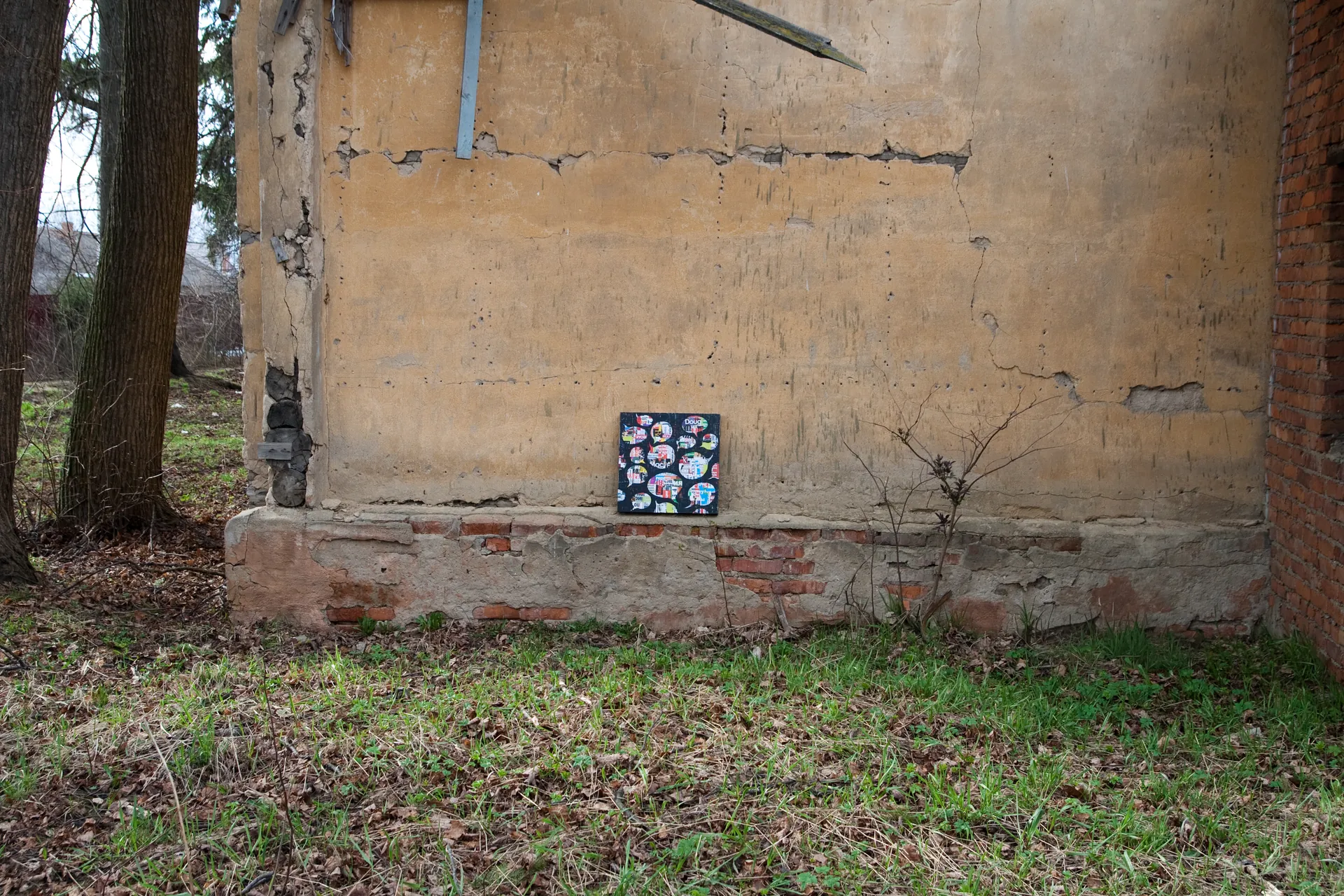Artwork against an aged wall